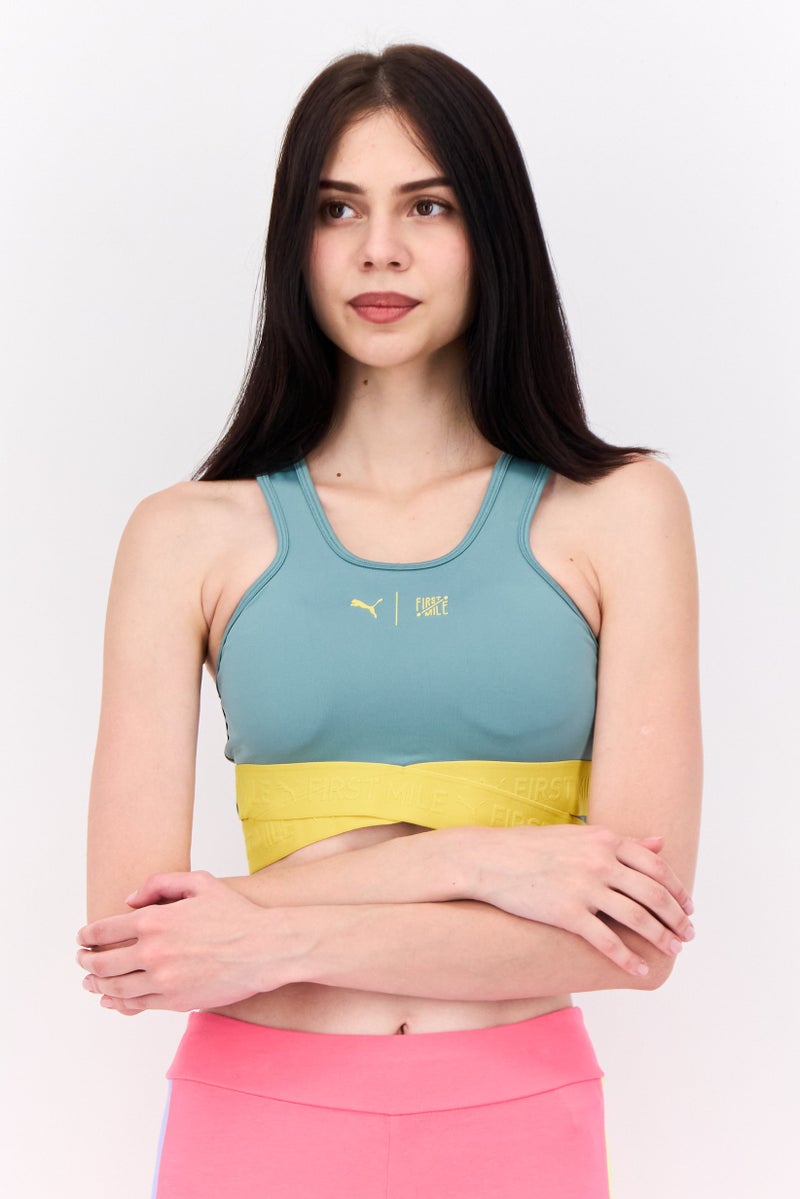 PUMA صدرية رياضية غير مبطنة بشعار علامة بومة x فيرست مايل للنساء، أخضر حكيم - Image 1