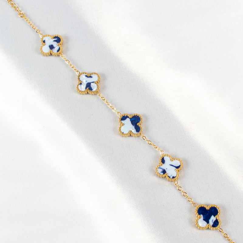 ذا بلاك بيرل اكسسوريز أنسيال أستانليس ستيل ذهبي مع شكل زهرة البرسيم بألوان خلابة - Image 2