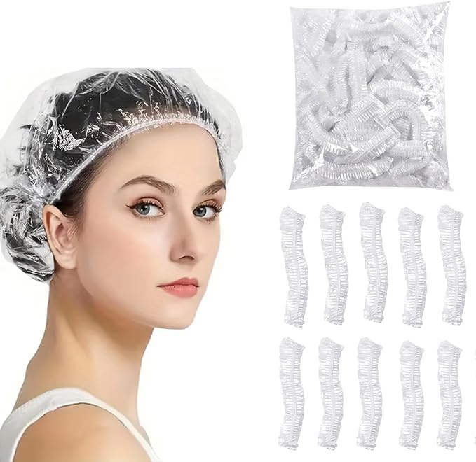 PIRU Disposable Shower Caps Pack of 100 – Clear Waterproof Plastic Hair Bath Caps with Elastic, Free Size, Reusable & Portable Shower Head Covers for Men & Women, Hotels, Spa, Salon, Travel & Home Use - Image 1