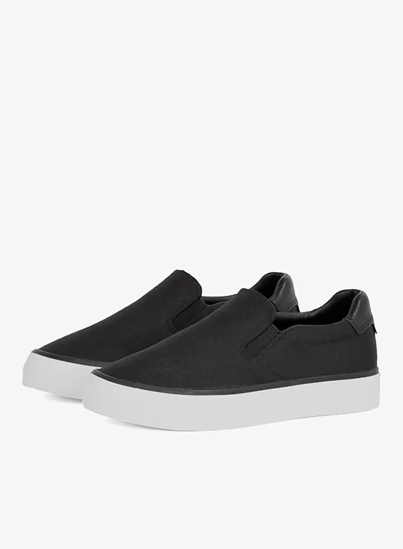 CALVIN KLEIN  VULCANISED JACQUARD SLIP ON TRAINERS for Women | Best Price UAE