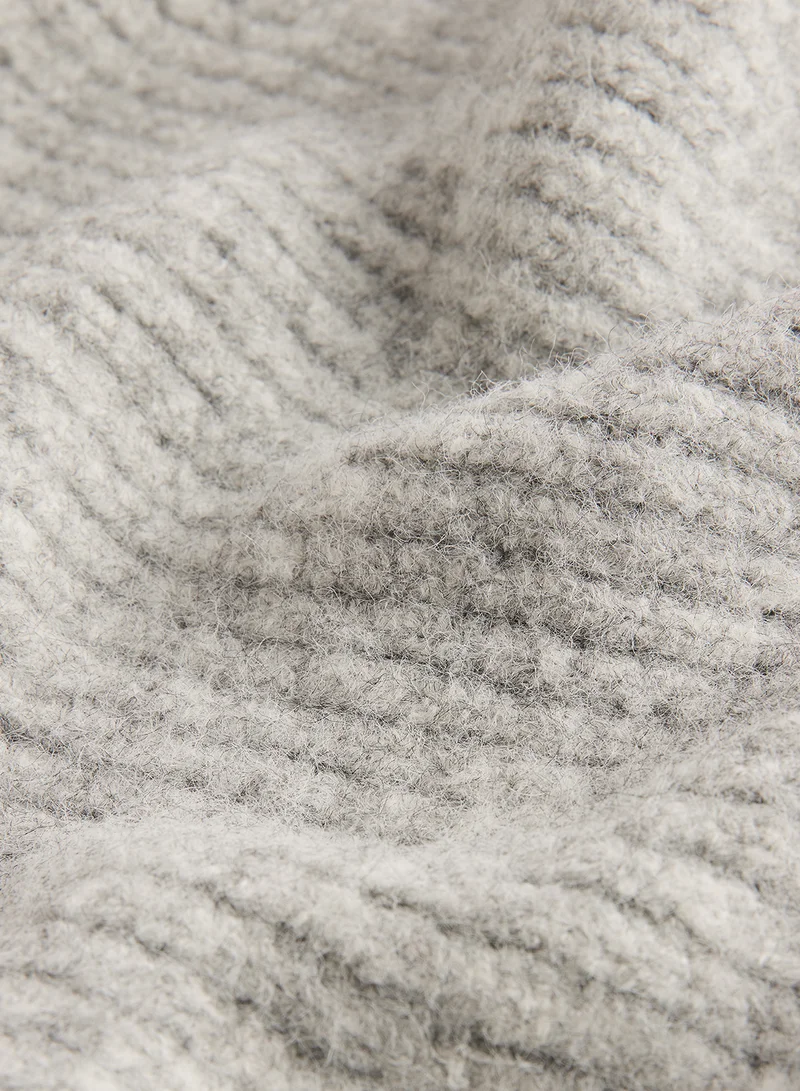 تيد بيكر وشاح كيريسا محبوك بتفاصيل حجر الراين