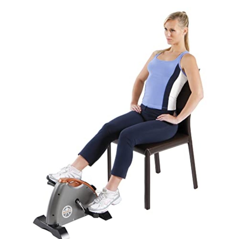 Under desk mini pedal leg and arm exercise cycle for home office use, made of durable steel with black finish, featuring smooth adjustable magnetic resistance for low-impact physical therapy workouts - Image 1