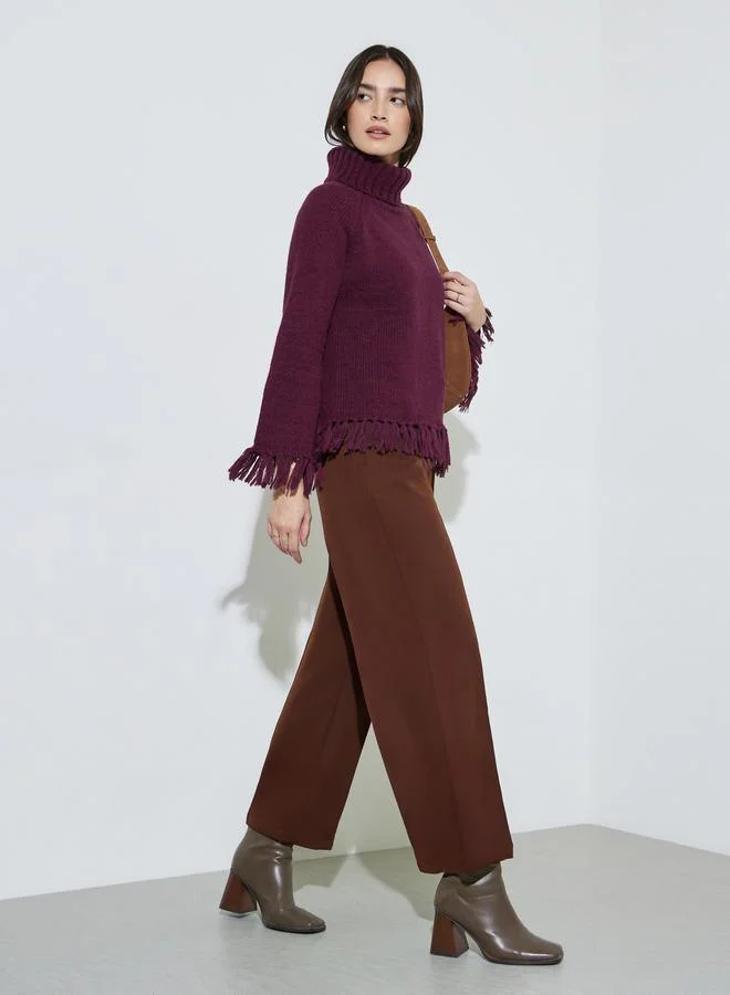 Styli Burgundy Knitted Turtle Neck Sweater With Tassel Hem Detail