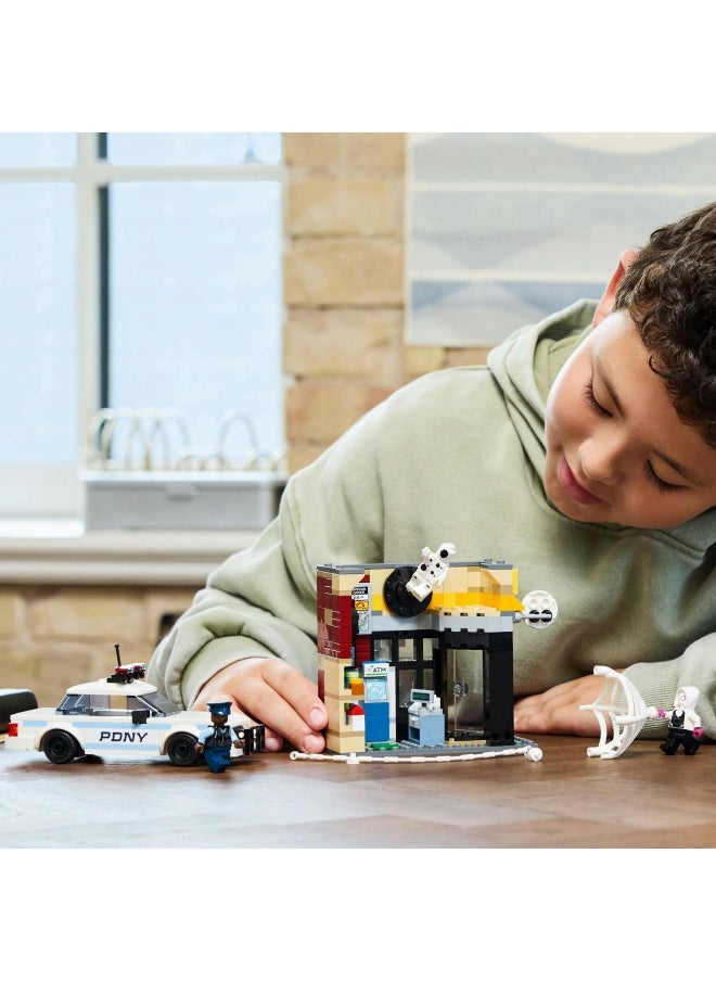 LEGO - Marvel Spider-Verse: Miles Morales vs. The Spot - Super Heroes Playset with a Buildable Toy Car, 4 Minifigures & a Shop - Birthday Gift for 9 Plus Year Old Boys & Girls 76311 (375 pieces) - Image 1