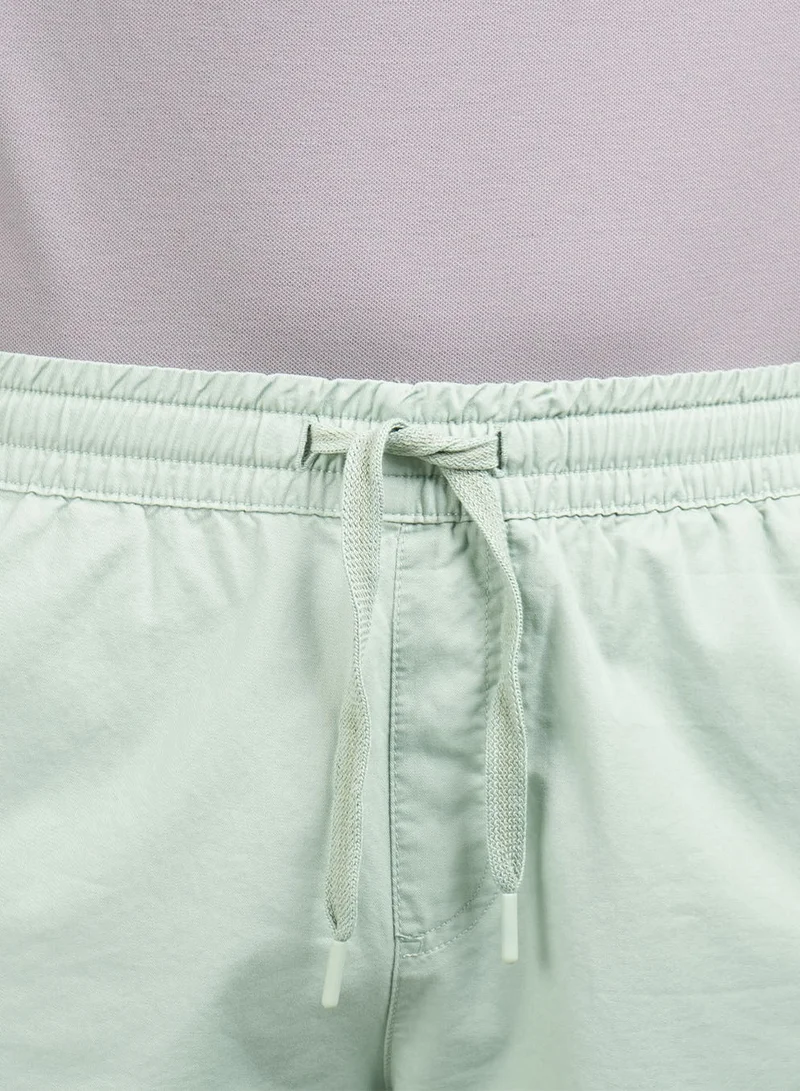 GIORDANO  Men's Cotton Twill Bermuda Shorts: Slim Fit, Elastic Waist, Ultimate Comfort for Men | Best Price UAE