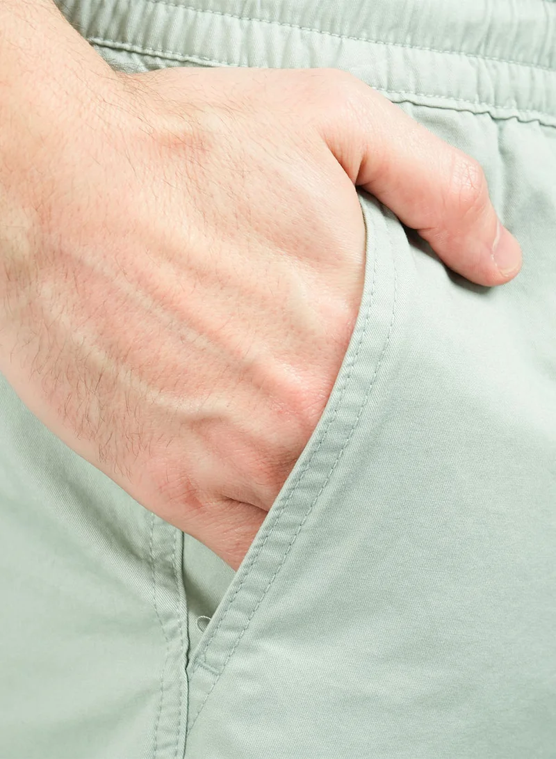 GIORDANO  Men's Cotton Twill Bermuda Shorts: Slim Fit, Elastic Waist, Ultimate Comfort for Men | Best Price UAE