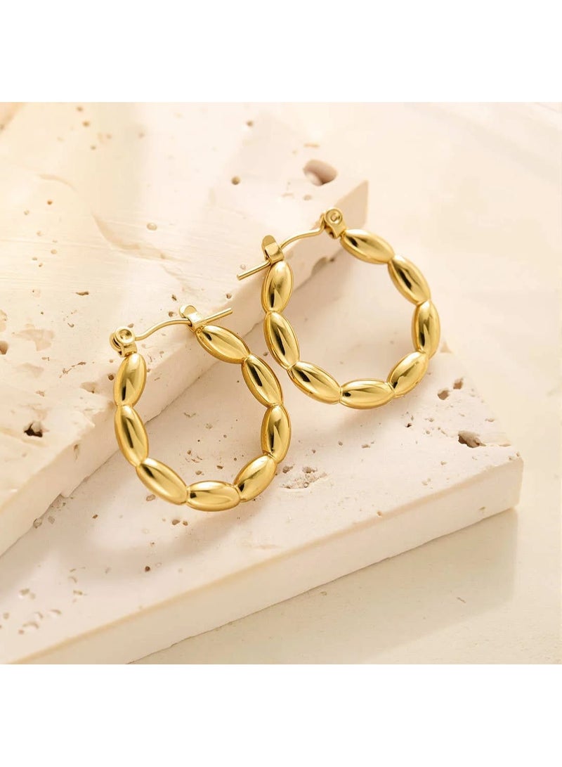 Luxuria Women's gold round earrings with an oval beaded design (Beaded Loop Hoops), which are elegant women's jewelry featuring loops made up of successive pieces resembling shiny, polished coffee beans. - Image 1