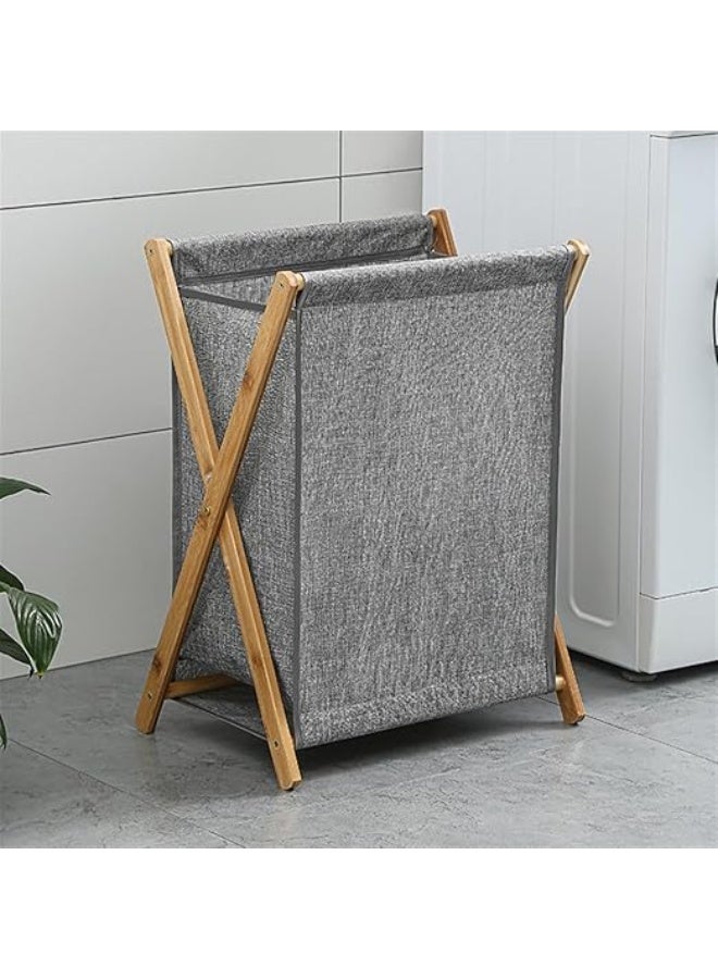 Foldable laundry basket with a wooden frame and durable fabric – practical and stylish design - Image 1