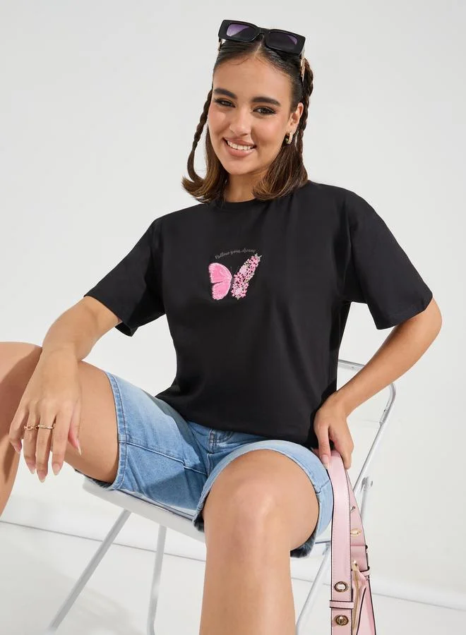 ستايلي تيشيرت فضفاض بياقة دائرية واكتاف منخفضة