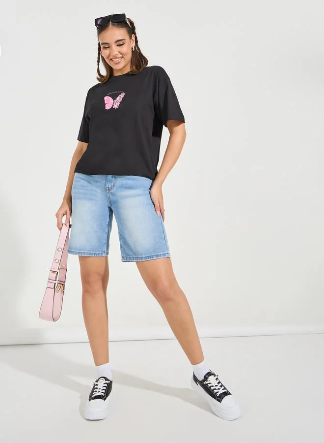 ستايلي تيشيرت فضفاض بياقة دائرية واكتاف منخفضة