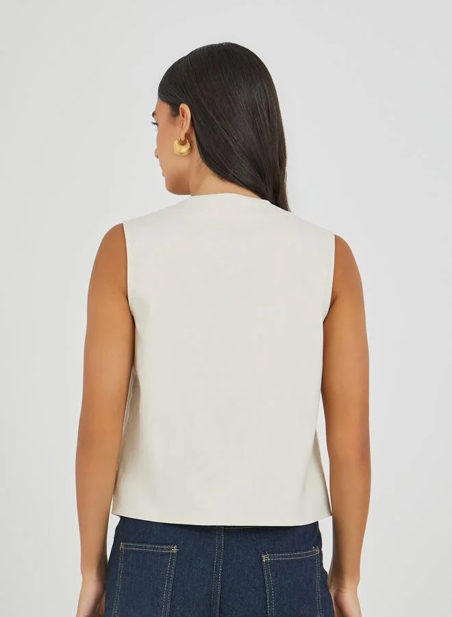 Styli Beige Styli Solid Sleeveless Buttoned Waistcoat for Women | Best Price UAE