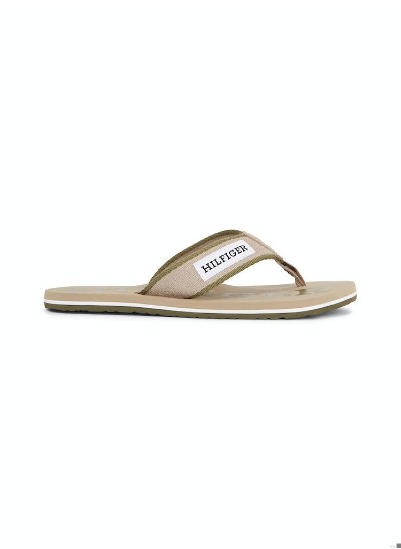 TOMMY HILFIGER - Men's Hilfiger Monotype Webbing Strap Flip-Flops -  Polyester webbing upper, Beige - Image 1