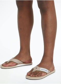 TOMMY HILFIGER Men's Hilfiger Monotype Webbing Strap Flip-Flops -  Polyester webbing upper, Beige  - Image 2