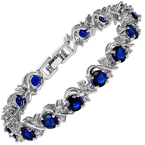 RIZILIA BLOSSOM Round Simulated Blue Sapphire and White Cubic Zirconia 18K White Gold Plated Tennis Bracelet, 7" - Image 1