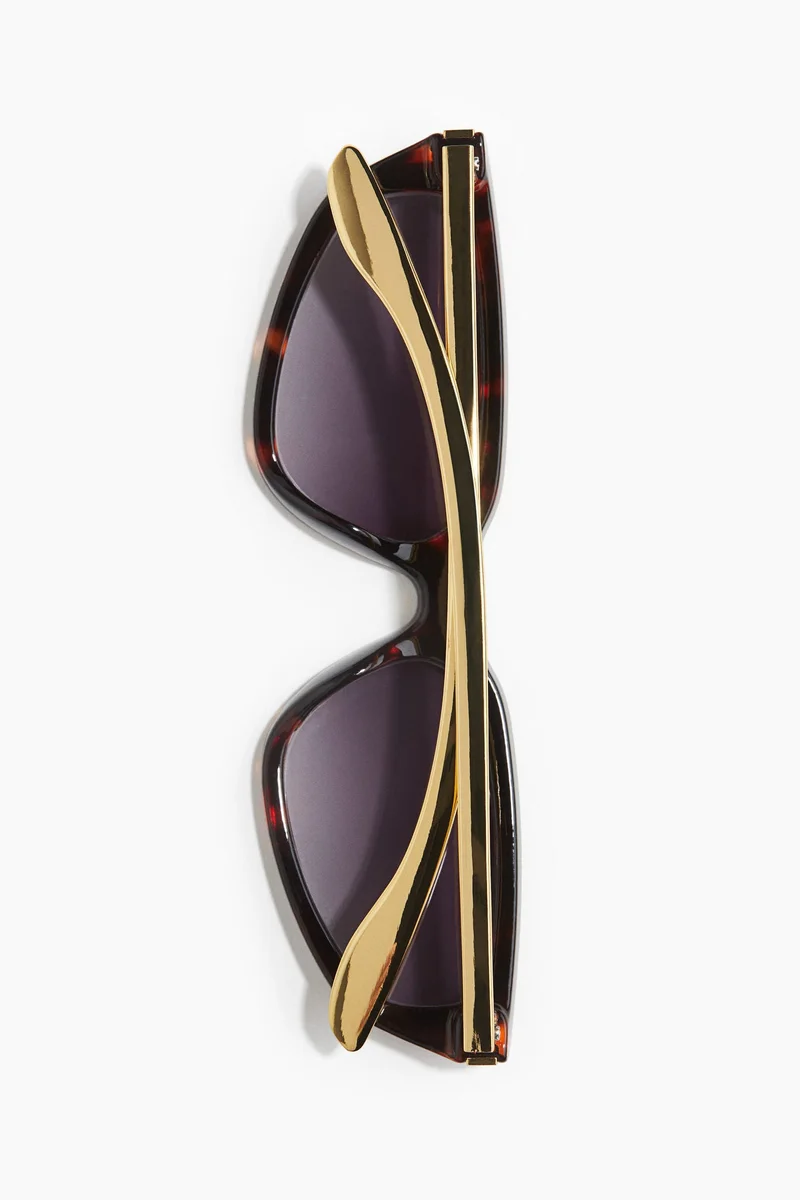 اتش اند ام نظارات شمسية بتصميم زاوية