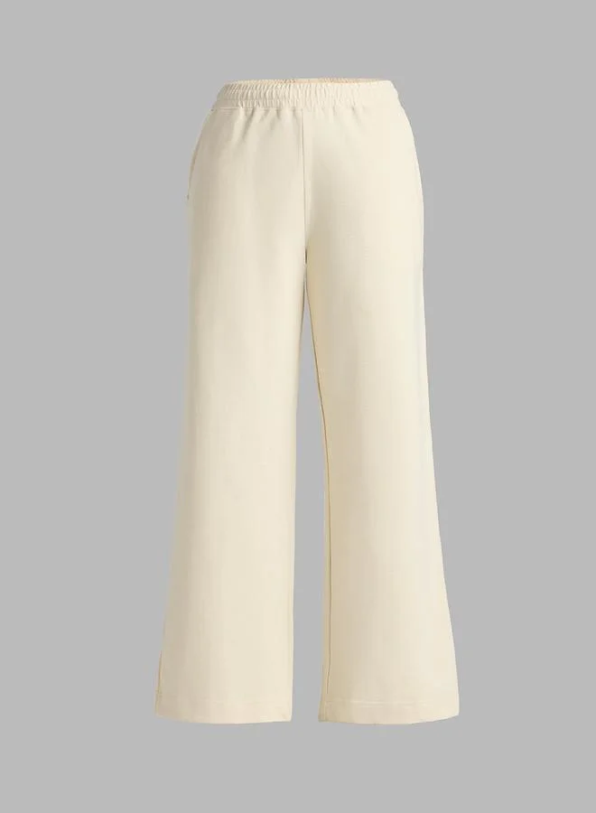 The Souled Store  Cream Solid Flared Joggers for Women | Best Price UAE