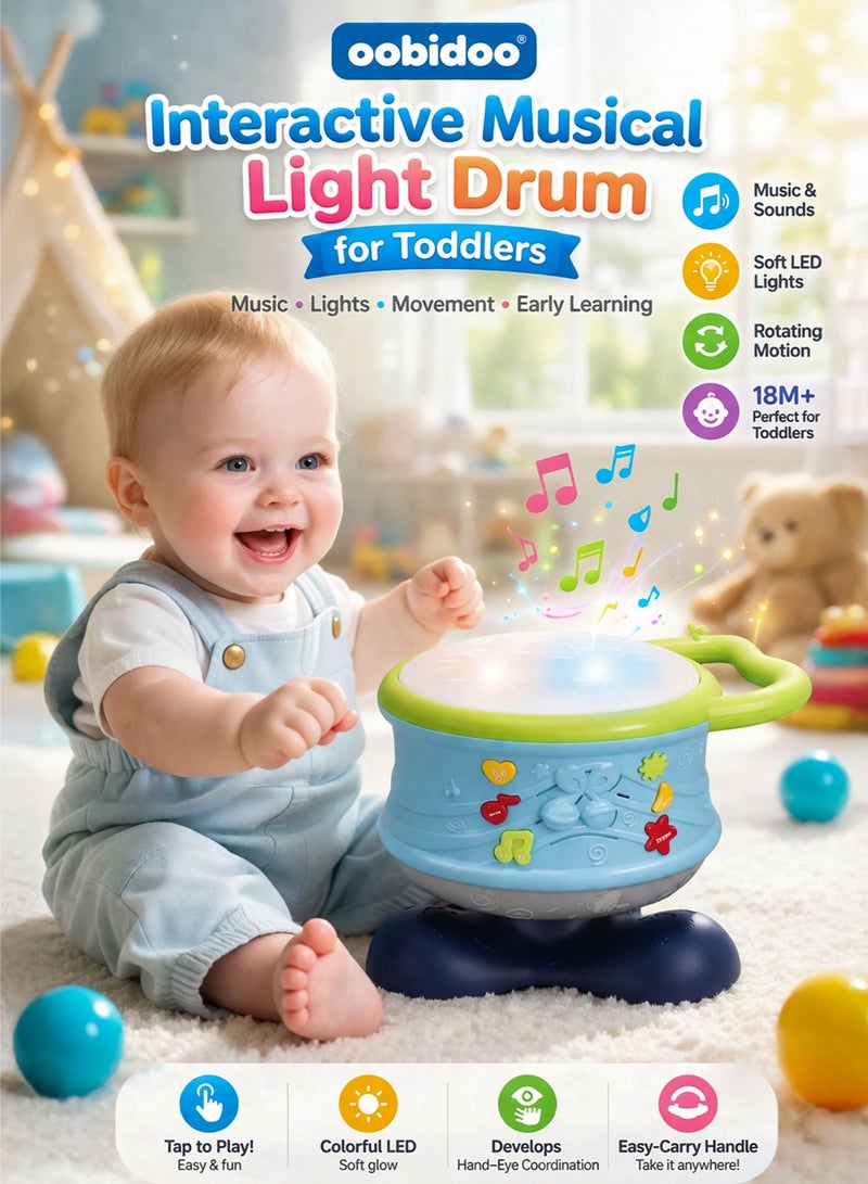 Oobidoo Interactive Musical Light Drum Toy for Toddlers 18M+, Baby Educational Learning Drum with LED Lights, Sound Effects, Rotating Rocking Motion, Sensory Development Toy, Hand Eye Coordination, Early Learning Music Toy, Portable Carry Handle Kids Drum Blue - Image 1