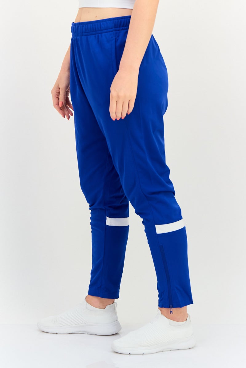 UNDER ARMOUR سروال تدريب فضفاض للنساء، أزرق - Image 2