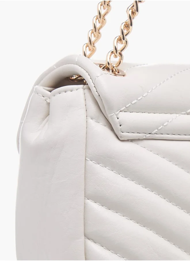 Celeste Womens Quilted Crossbody Bag With Button Closure And Chain Strap
