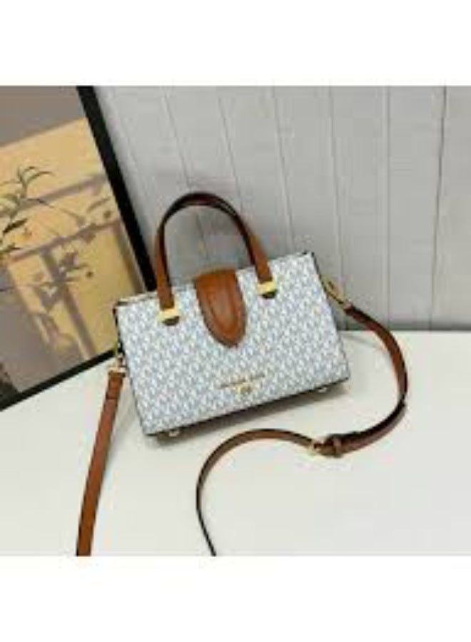 Michael Phelps Elegant Monogram Top-Handle Crossbody Bag - Image 1