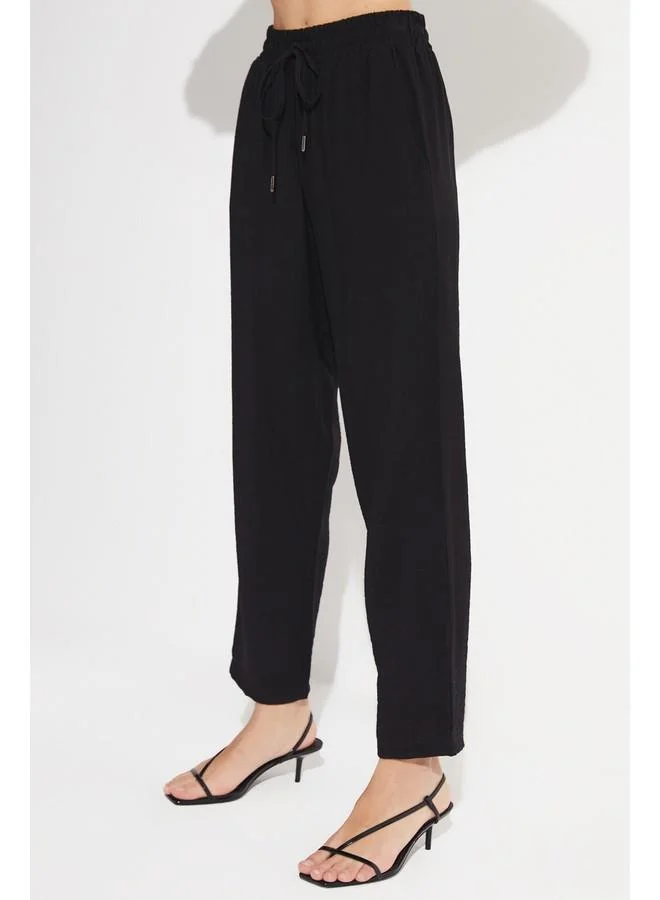 جون June Women Exclusive Elastic Waist Viscose Blend Jogger Woven Trouser Black