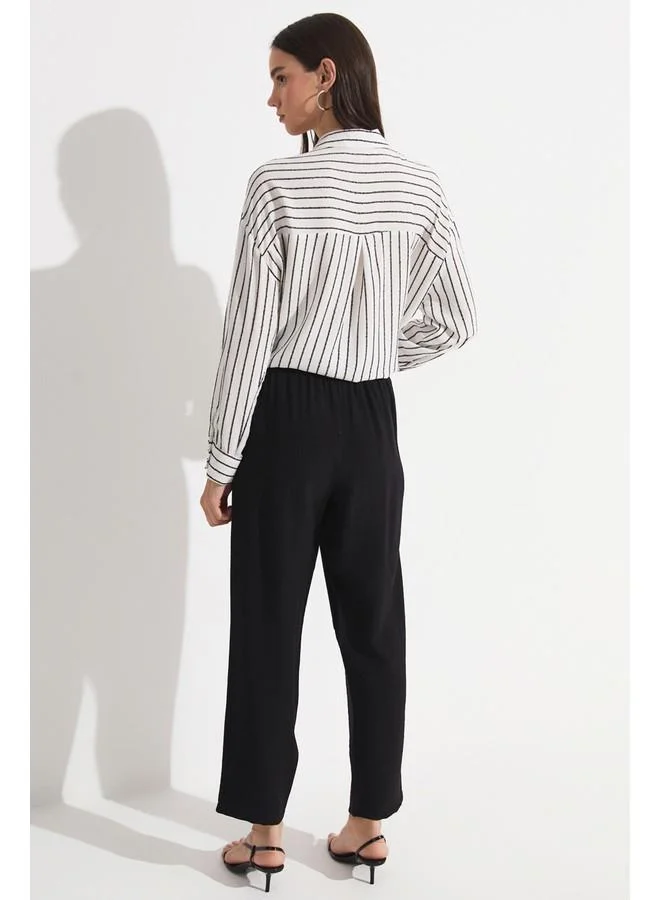 جون June Women Exclusive Elastic Waist Viscose Blend Jogger Woven Trouser Black