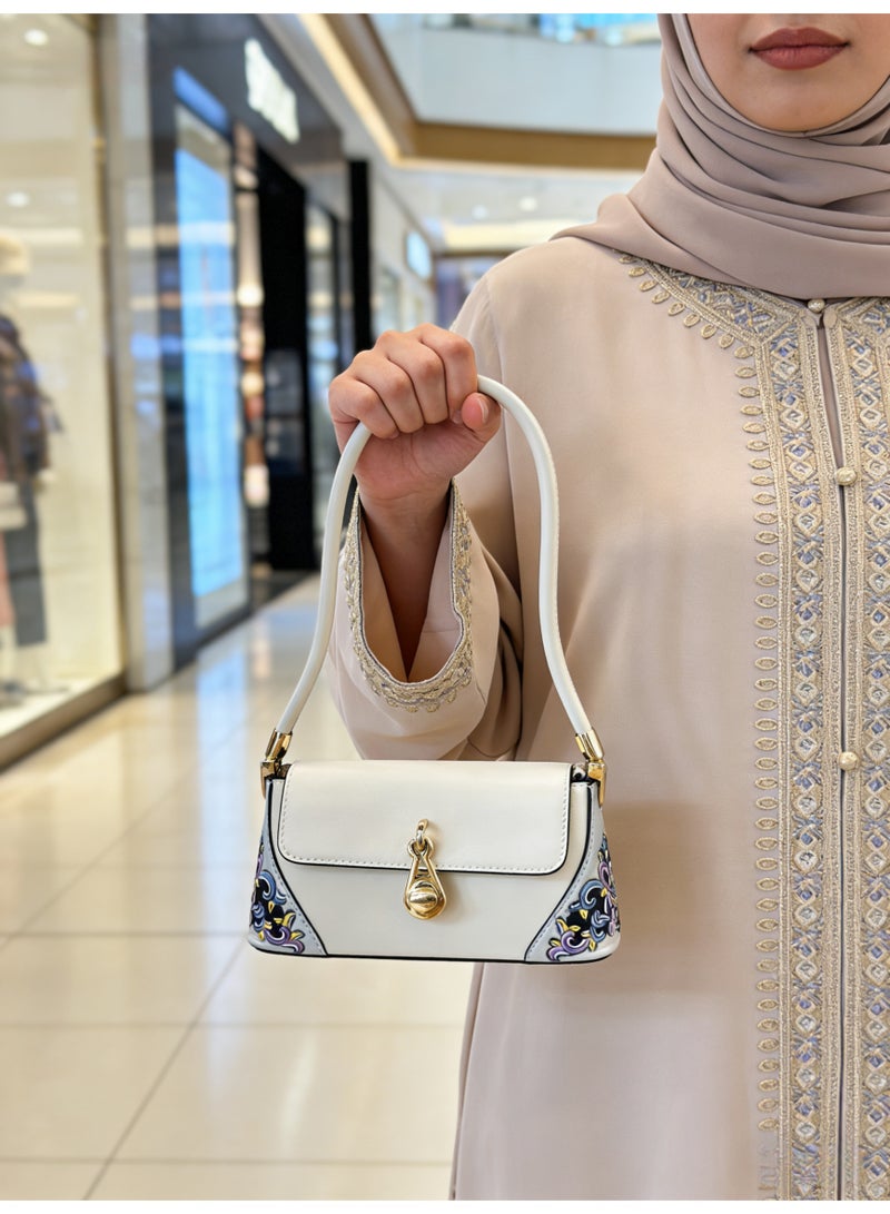 حقيبة يد من الجلد الطبيعي المنحوت والمطلي يدوياً بمقبض علوي - Image 2