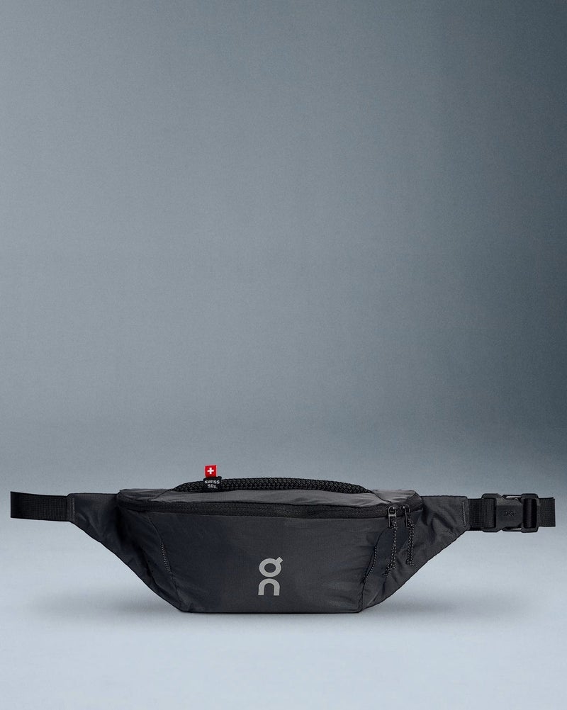 ON Running Lightweight Running Waist Bag, Waist Pack, Waist Belt Bag, Cross Body Bag 2L for Men & Women, Ultra-Light Water-Resistant Nylon Ripstop Belt Bag with Adjustable Strap, Reflective Details and Secure Zip Compartments, Black - Image 1