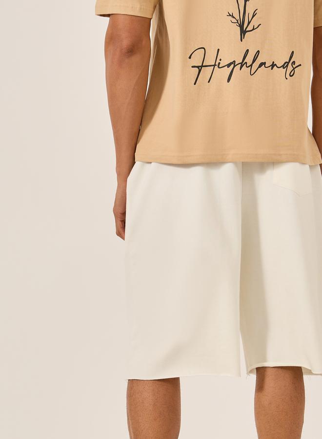 Styli Solid Raw Edge Hem Terry Oversized Shorts  - Image 4