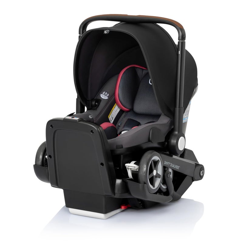 evenflo Shyft DualRide with Carryall Storage Infant Car Seat and Stroller Combo Sylva Pink