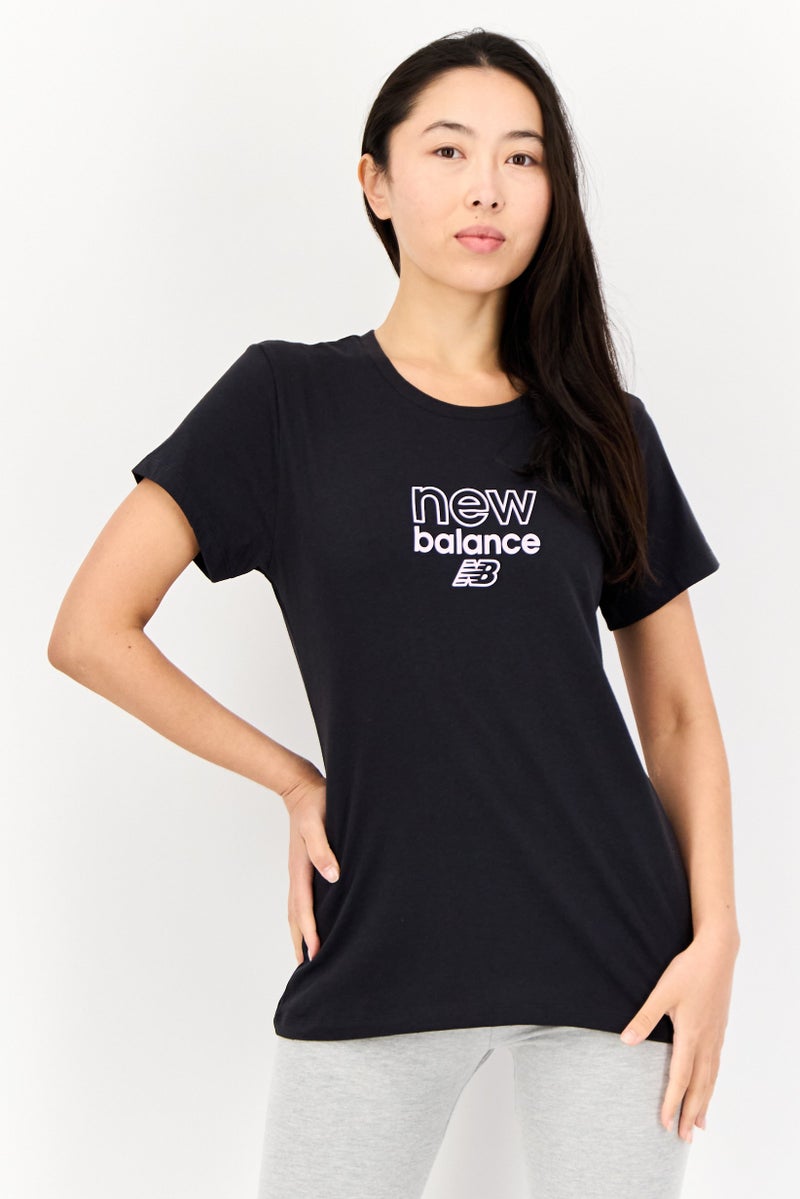 New Balance Women Sportswear Fit Short Sleeve Outdoor T-Shirt, Black  - Image 1