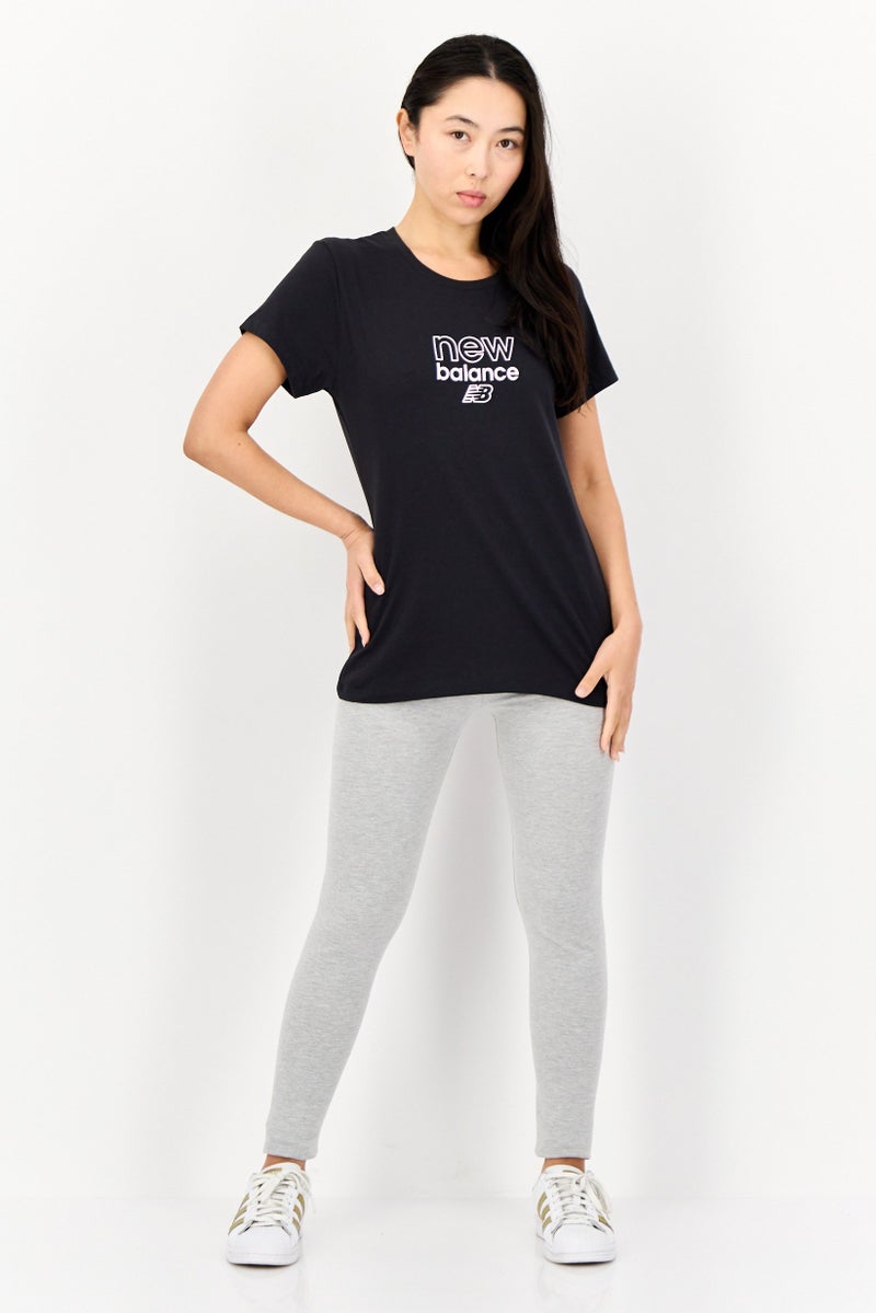 New Balance Women Sportswear Fit Short Sleeve Outdoor T-Shirt, Black  - Image 4