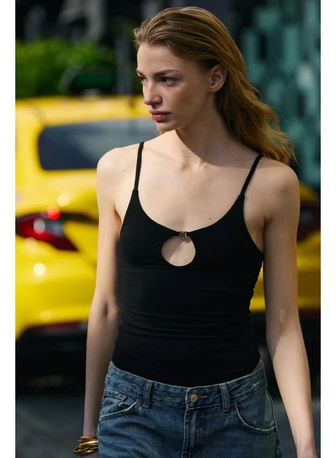 Grimelange FAUSTINA Women's Soft and Stretchy Fabric Body-Hugging Strappy Snap-Button Black Blouse.
