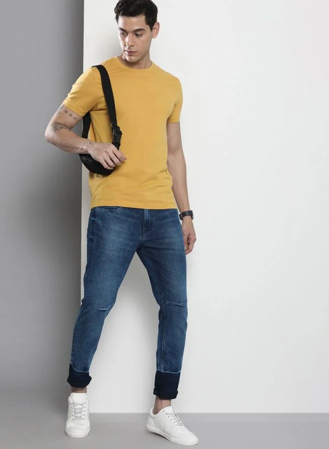 The Indian Garage Co Men Carrot Fit Solid Mid-Rise Stretchable Jeans