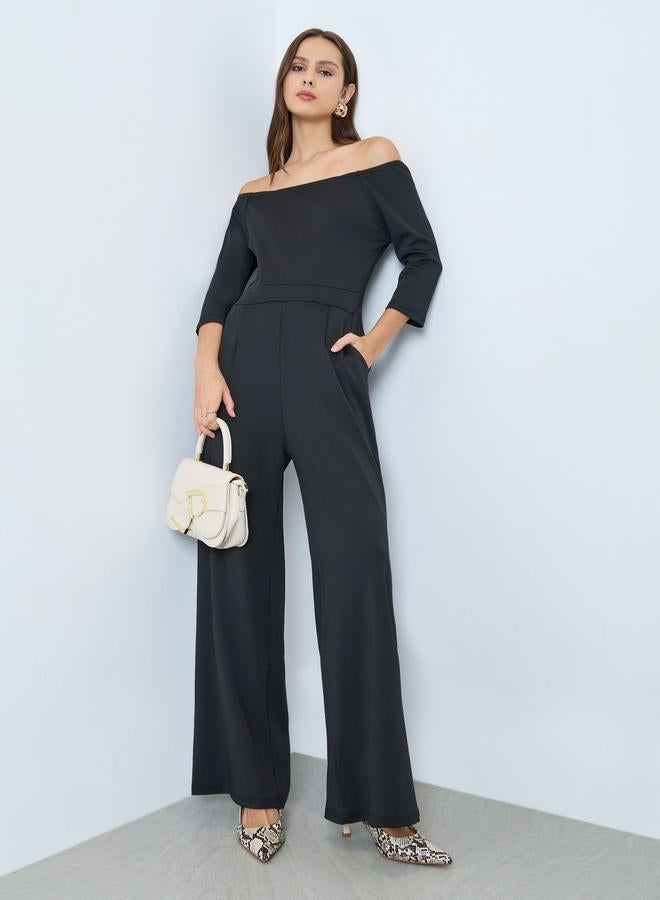 تايك تو جمبسوت بأكتاف مكشوفة وأرجل واسعة أسود - Image 1