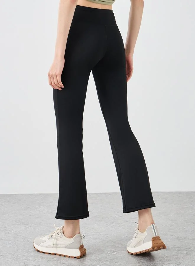 تايك تو Take Two Solid Elastic Waist Flared Leggings