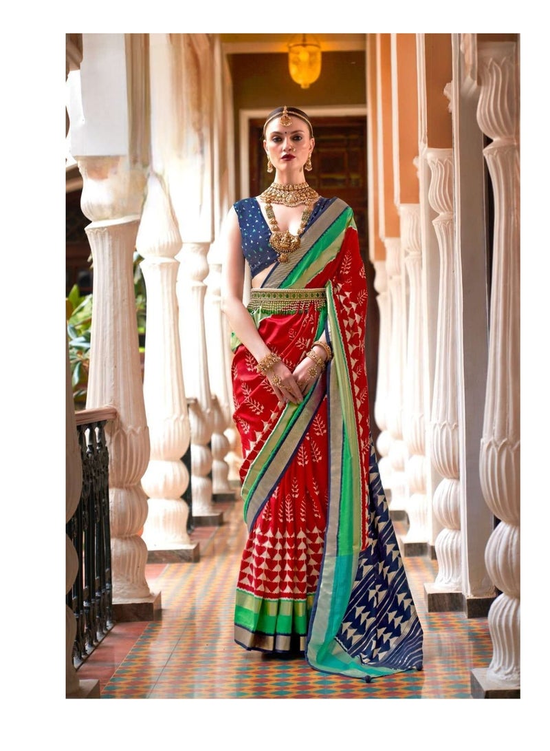 Grab Mantra Red Blue Patola Silk Saree With Green Border And Unstitched Contrast Blue blouse  - Image 2