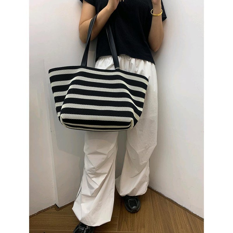 Niche Striped Hollow Woven Bag Cowhide Large Bag Women'S Large Capacity Tote Bag Portable Shoulder Underarm Bag Beach Bag - Image 1