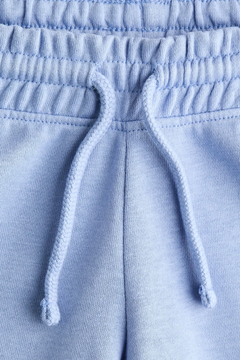 اتش اند ام بنطلون رياضي بحافة واسعة