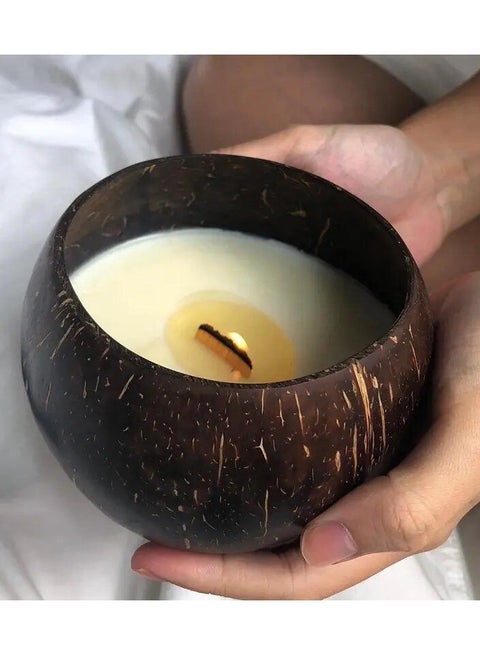 Scented candle in organic coconut shell