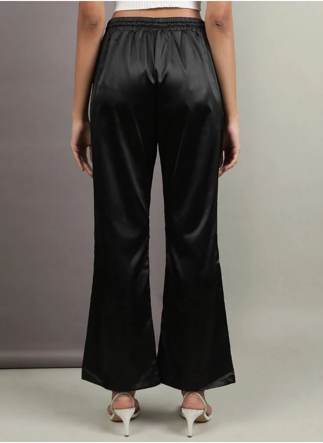 مرفوعة Women Flared Solid High-Rise  Pants