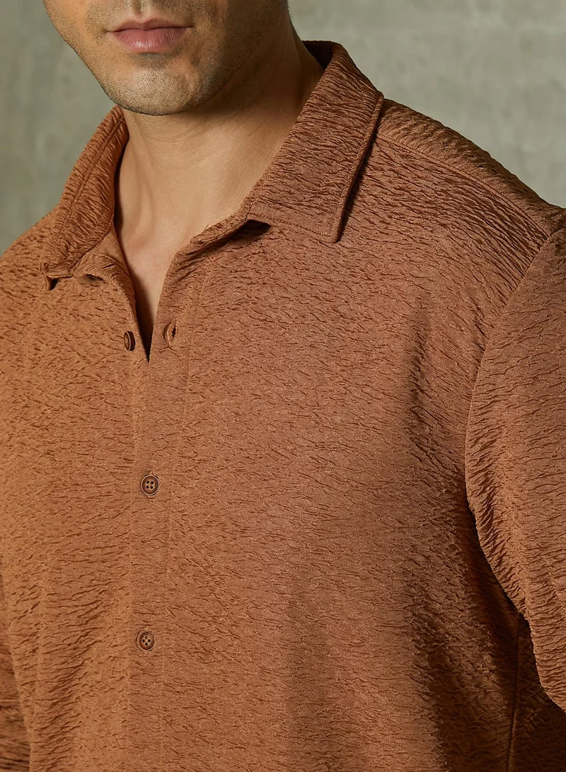 Campus Sutra Campus Sutra Men's Mocha Brown Surf-Tactile Shirt For Casual Wear | Spread Collar | Long Cuffed Sleeves | Button Closure | Shirt Crafted With Comfort Fit For Everyday Wear