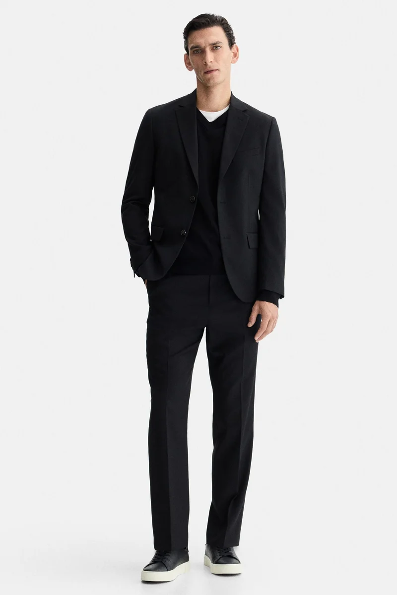 اتش اند ام جاكيت بصف أزرار فردي وبقصّة عادية