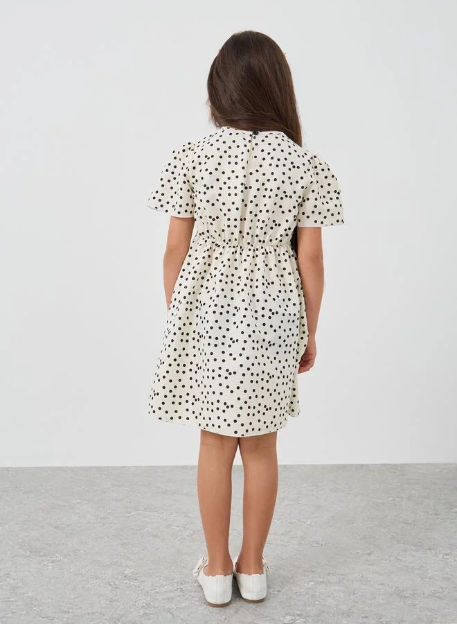 Styli Styli Girls Off White All-Over Print Smocked A-Line Dress with Bow Detail