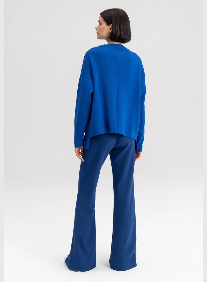 Touche KNIT SWEATER WITH LOW SHOULDER