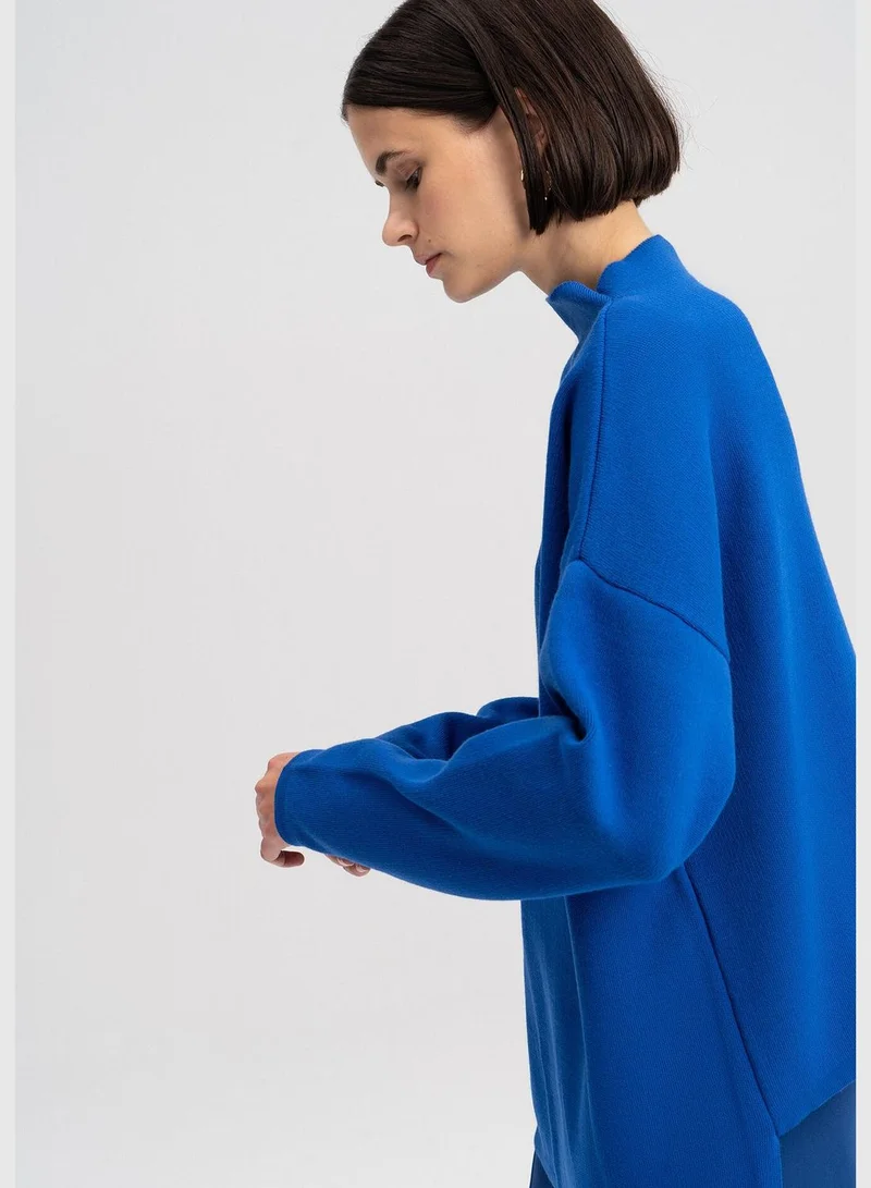 Touche KNIT SWEATER WITH LOW SHOULDER