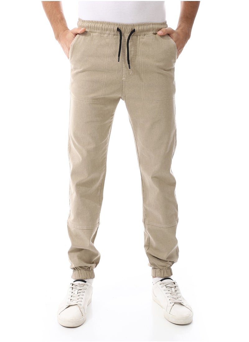 Elastic Waist With Drawstring Gabardine Sweatpants_ Beige - pzsku/ZC836F3C0F79F41D54BADZ/45/_/1728478654/c85a8cbf-a3db-4b2b-a863-10b65b1f972f