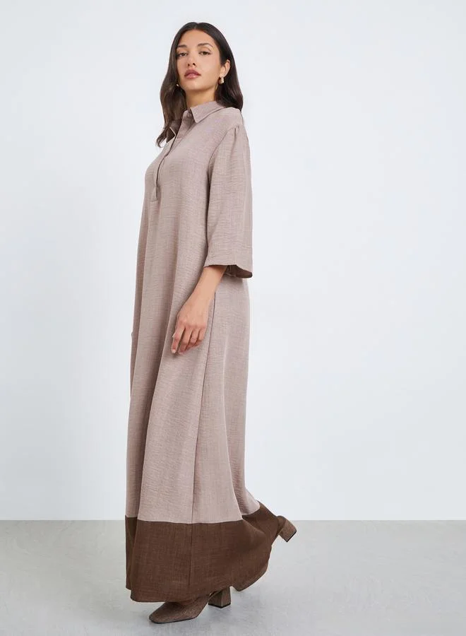 أميرة جلابية بياقة وحافة متباينة