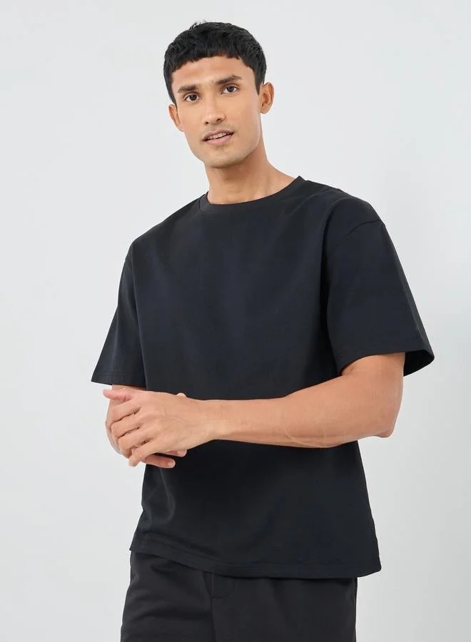 ستايلي تيشيرت أوفر سايز بطبعة جرافيك على الظهر