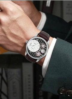 TOMI A distinctive wrist watch with analogues, a black leather strap, and a brown strap for men from TOMI, in addition to displaying the date on a daily basis.  - Image 1